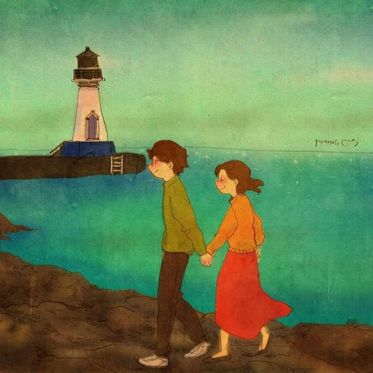 We walked along the ocean while holding our hands....